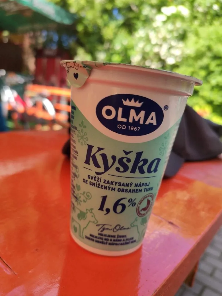 Kupole s kyškou, fermentovaný nápoj značky Olma.