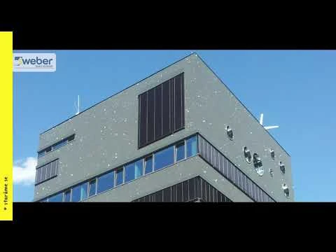 Modern building facade with cladding and windows