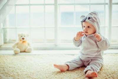 Baby sitting on floor